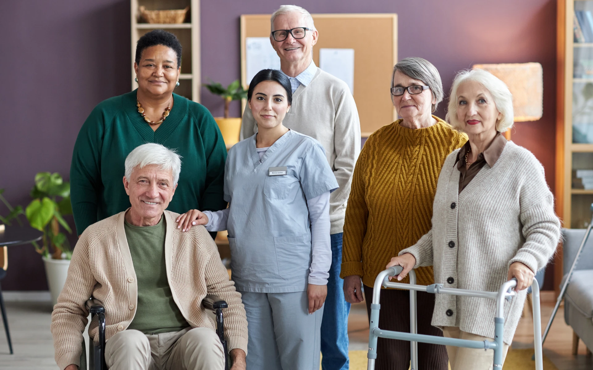 Diverse group of seniors with caregiver