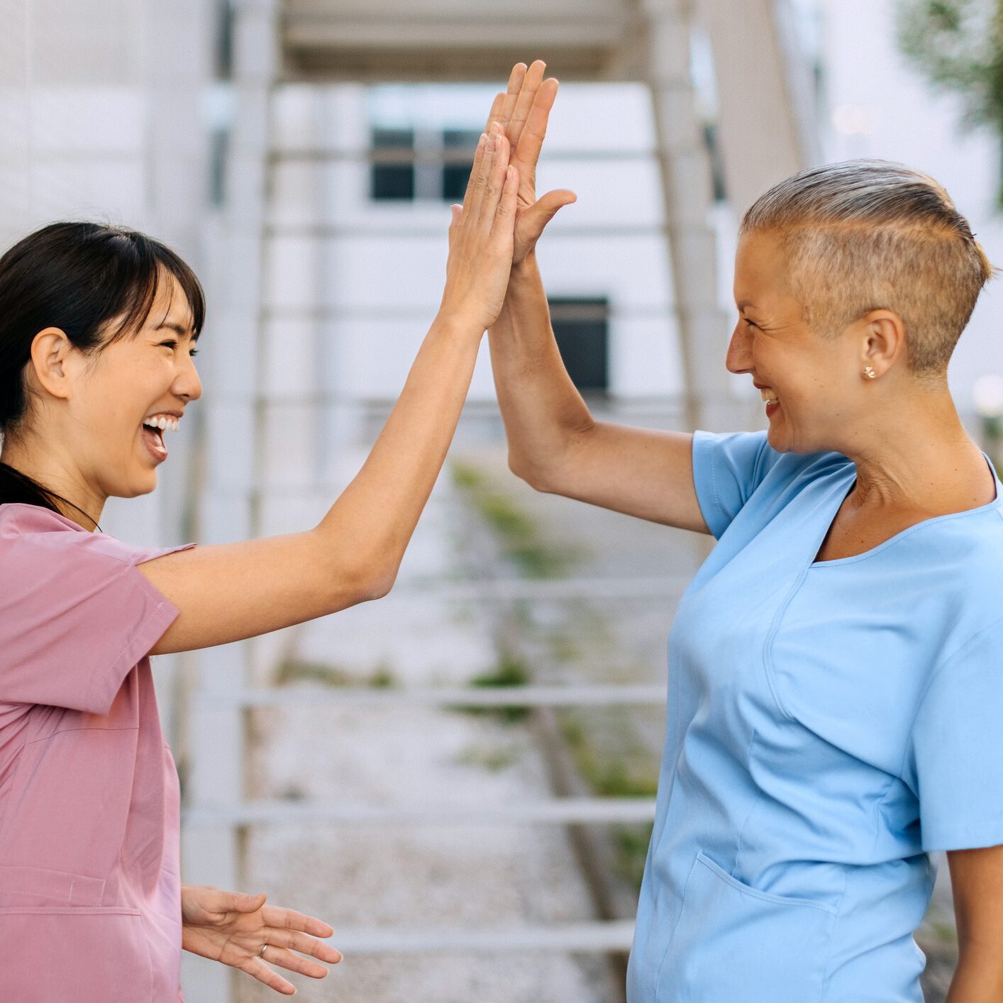 Healthcare workers sharing a successful moment