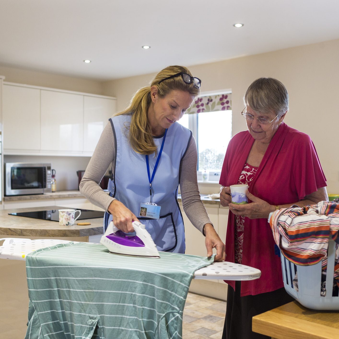 Two women doing laundry together